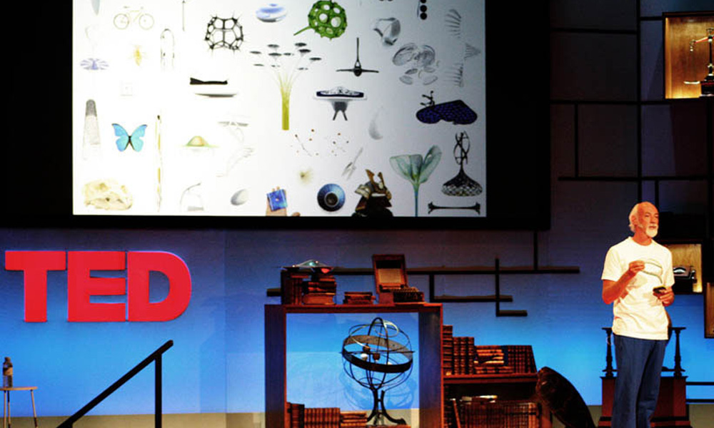 Photo of Ross Lovegrove presenting his work on the stage of TED conference
